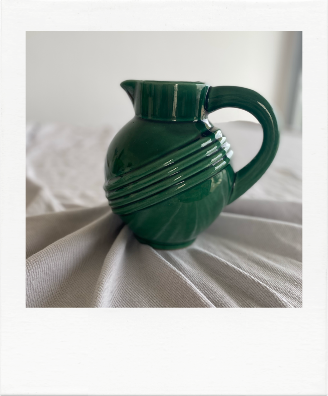 Large ceramic green ball pitcher