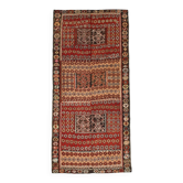 Kilim anatolien ancien tons rouges et beiges, motifs tribaux colorés