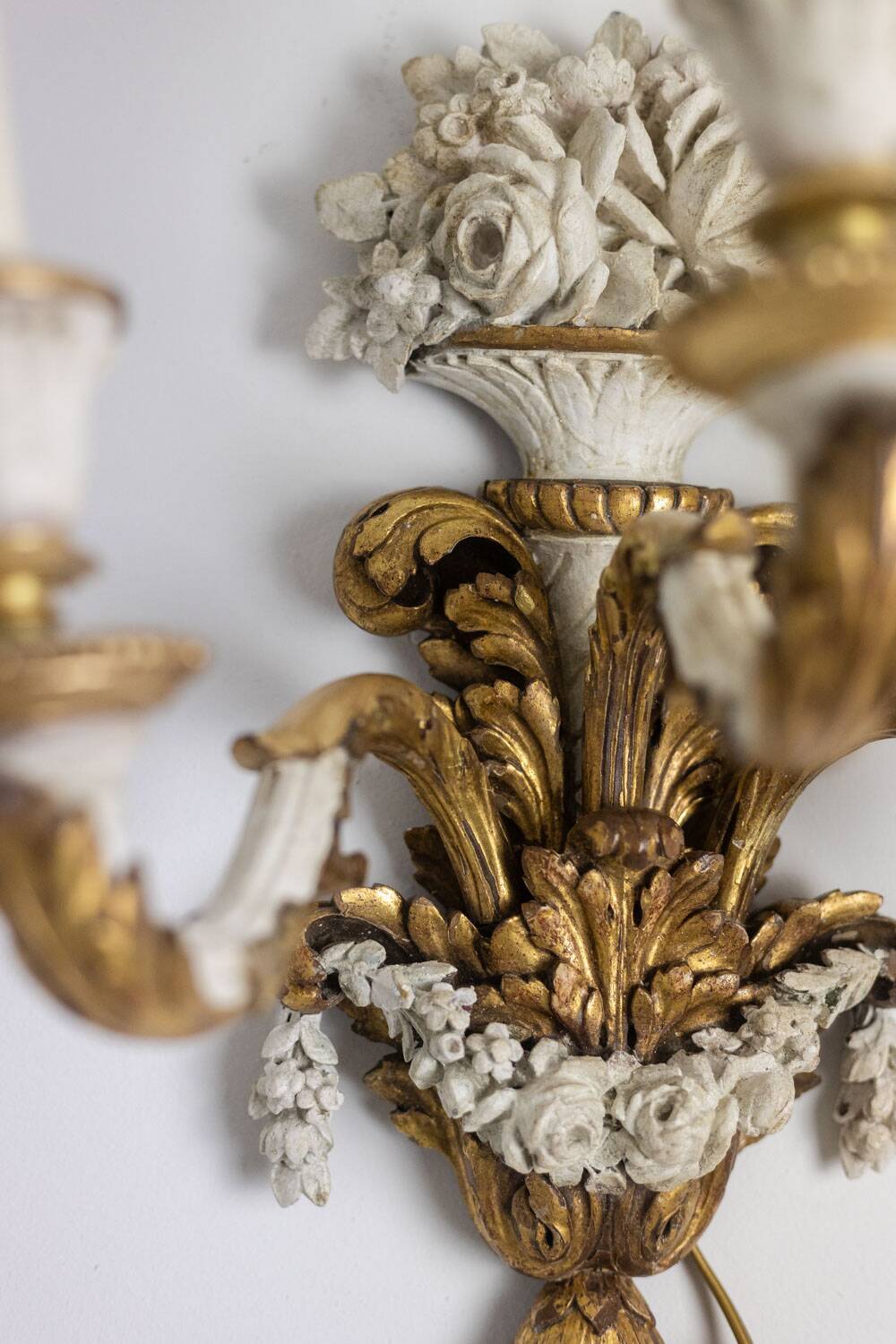 Pair of Louis XVI style wall lights in gilded and lacquered wood. Circa 1900.