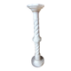 Marble effect column and its lamp