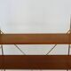 String wall shelf in gold metal and wood from the 60s