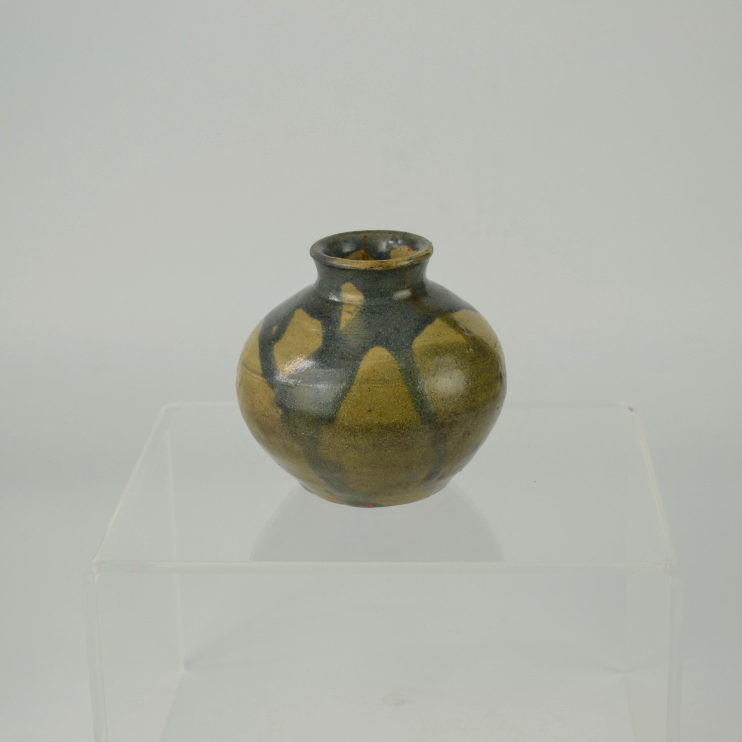 Sandstone ball vase by Eugène Lion