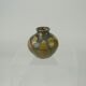 Sandstone ball vase by Eugène Lion