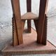 Triangular side table in carved wood, Art Nouveau, France, circa 1915.