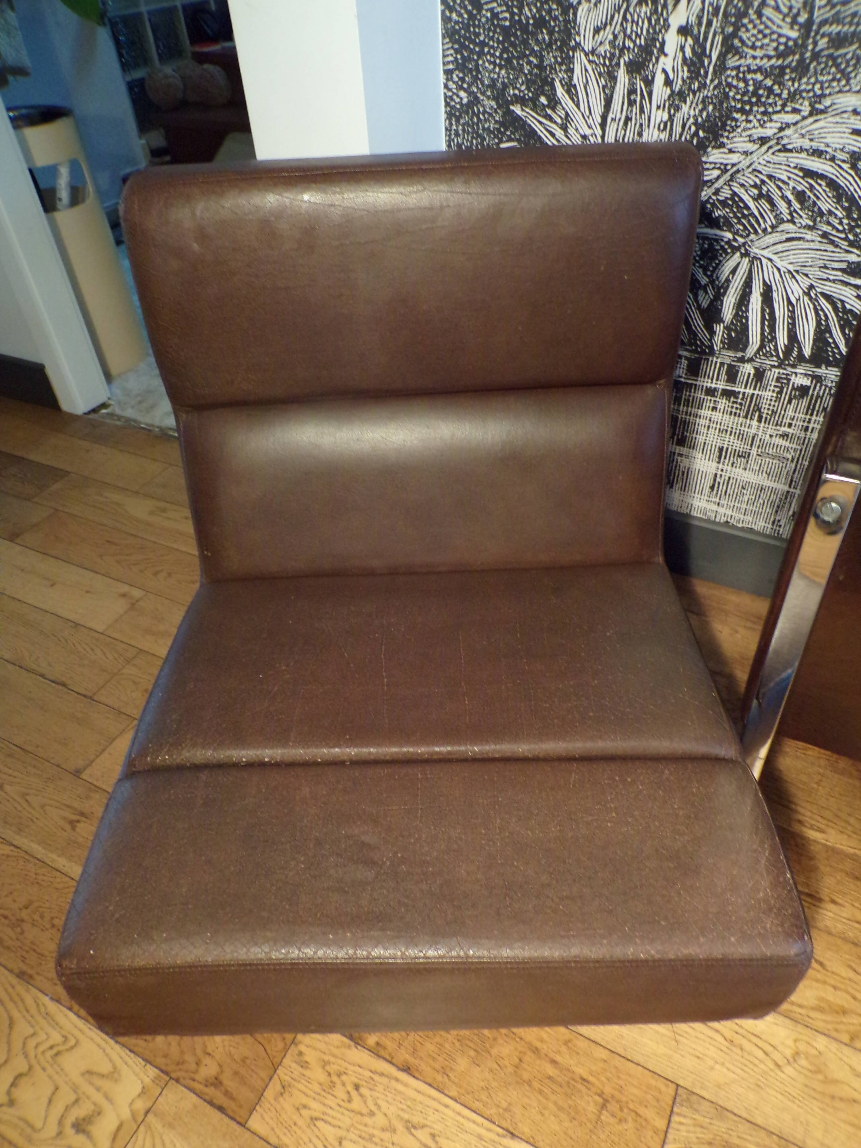 Trio of vinco armchairs in imitation leather