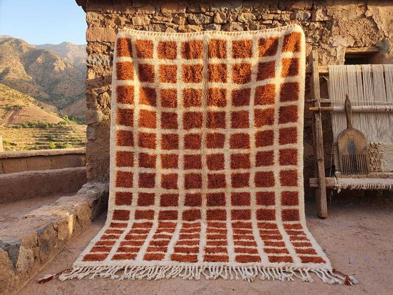 Ecru Moroccan rug with geometric patterns 200cm x 270cm.