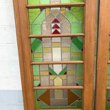 Series of three doors with stained glass windows