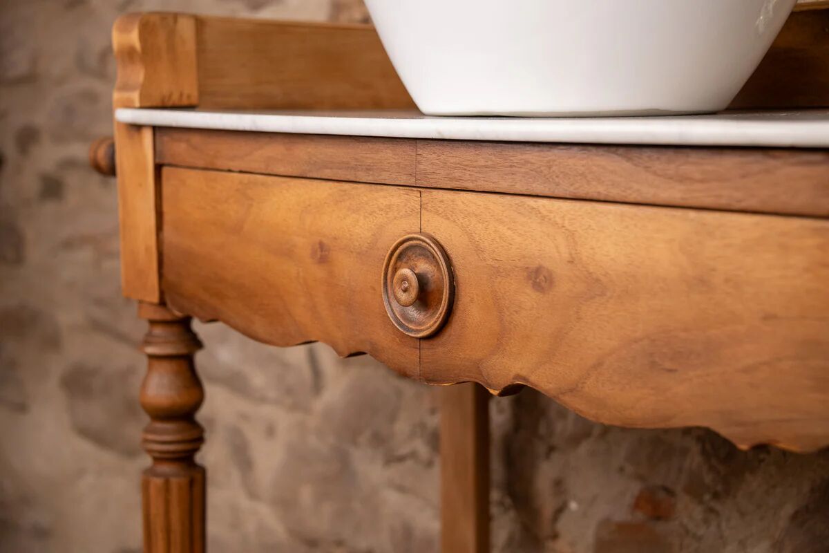 Marble and wood washbasin furniture in Louis-Philippe style.