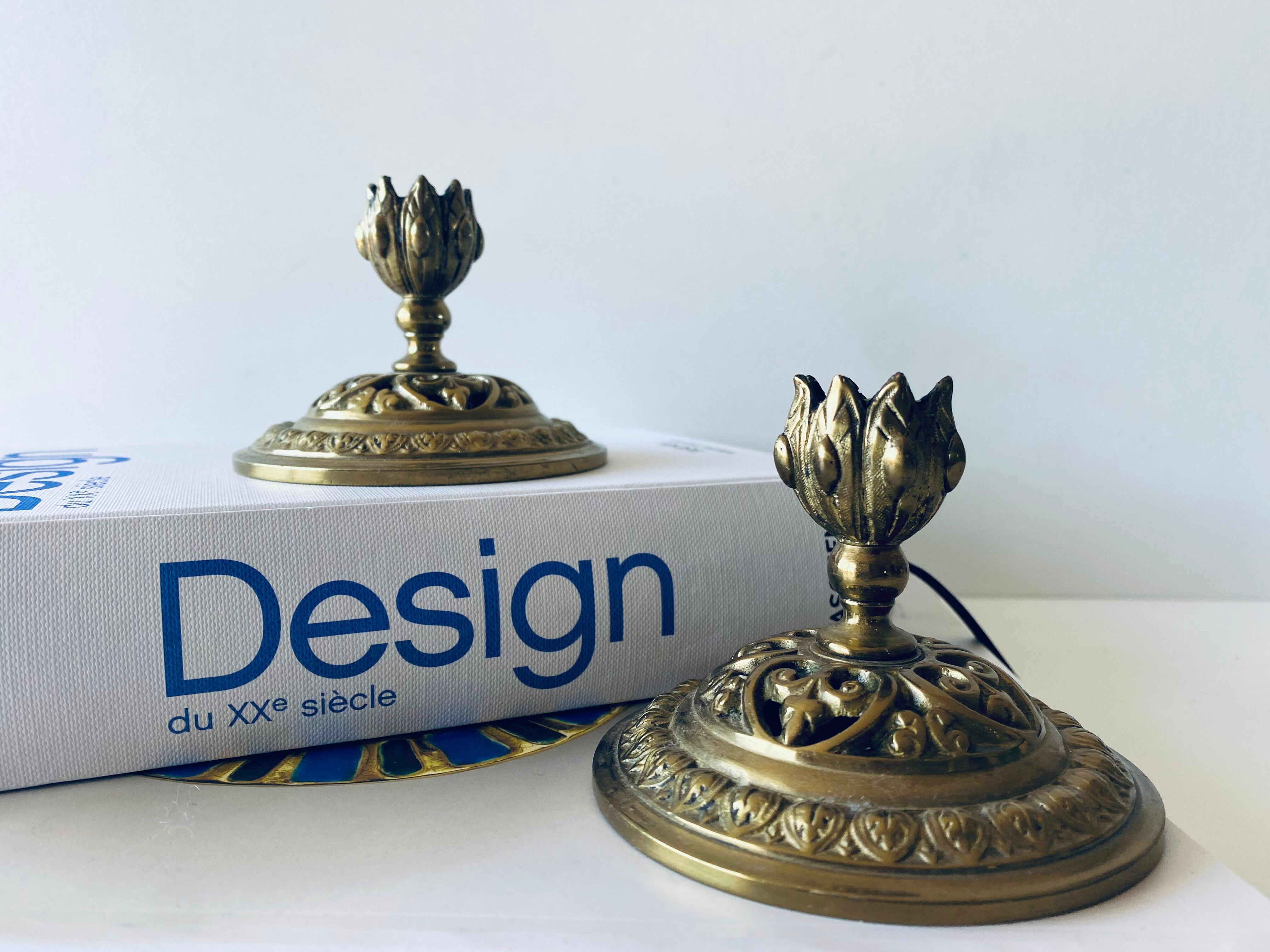 Pair of bronze candle holders signed