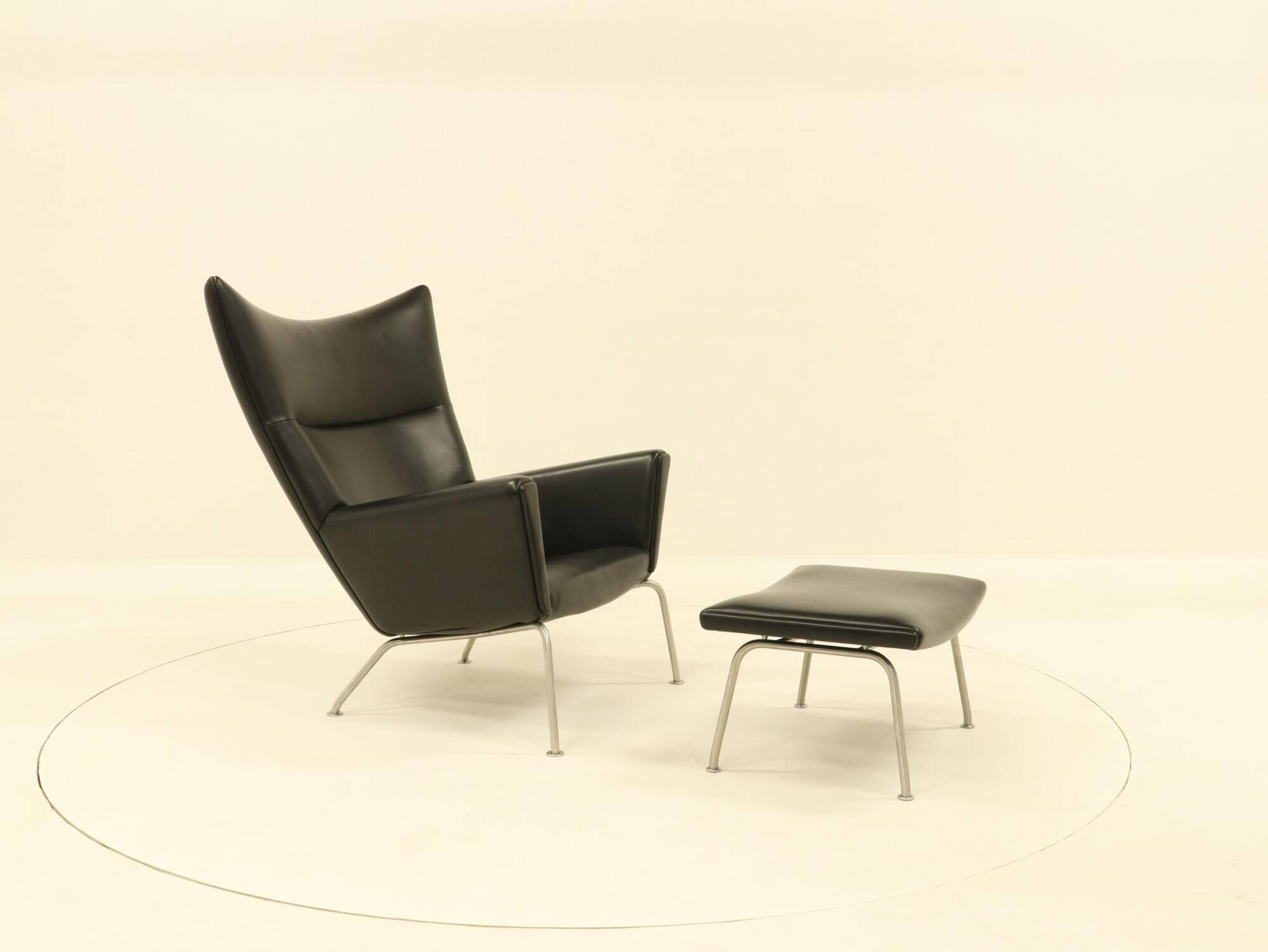 Wing chair & matching ottoman – CH445 & CH446 – by Hans Wegner