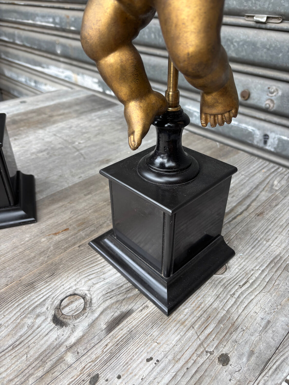 Pair of gilded cherubs on a Napoléon III base