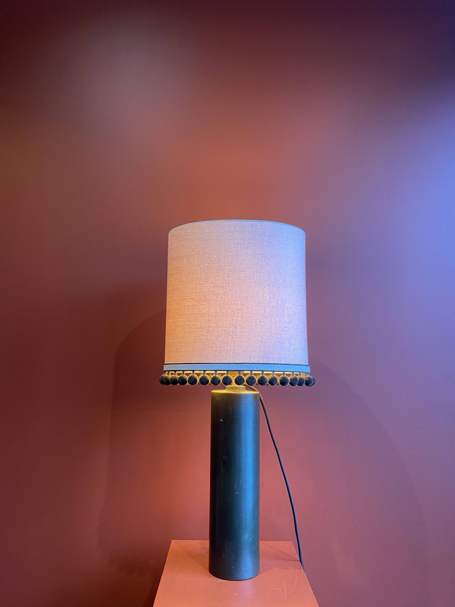 Copper "bouillotte" lamp with Ashoka Silk shade, pom-poms of c