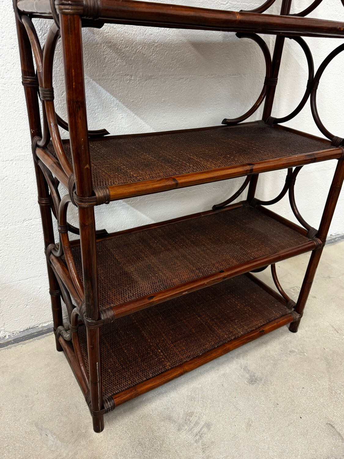 Dark rattan and bamboo bookshelf shelf