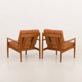 Rare Grete Jalk teak lounge chairs in aniline cognac leather for Cado