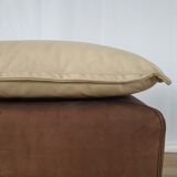 Fauteuil avec pouf en cuir et daim