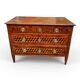 Louis XVI commode with marquetry featuring a design of precious wood cubes, 18th century.
