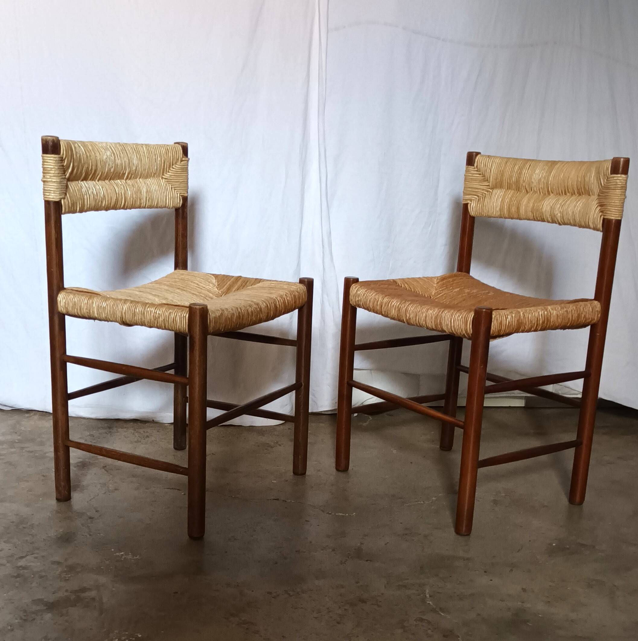 Pair of "Dordogne" chairs by Charlotte Perriand from the 1950s.