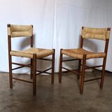 Pair of "Dordogne" chairs by Charlotte Perriand from the 1950s.