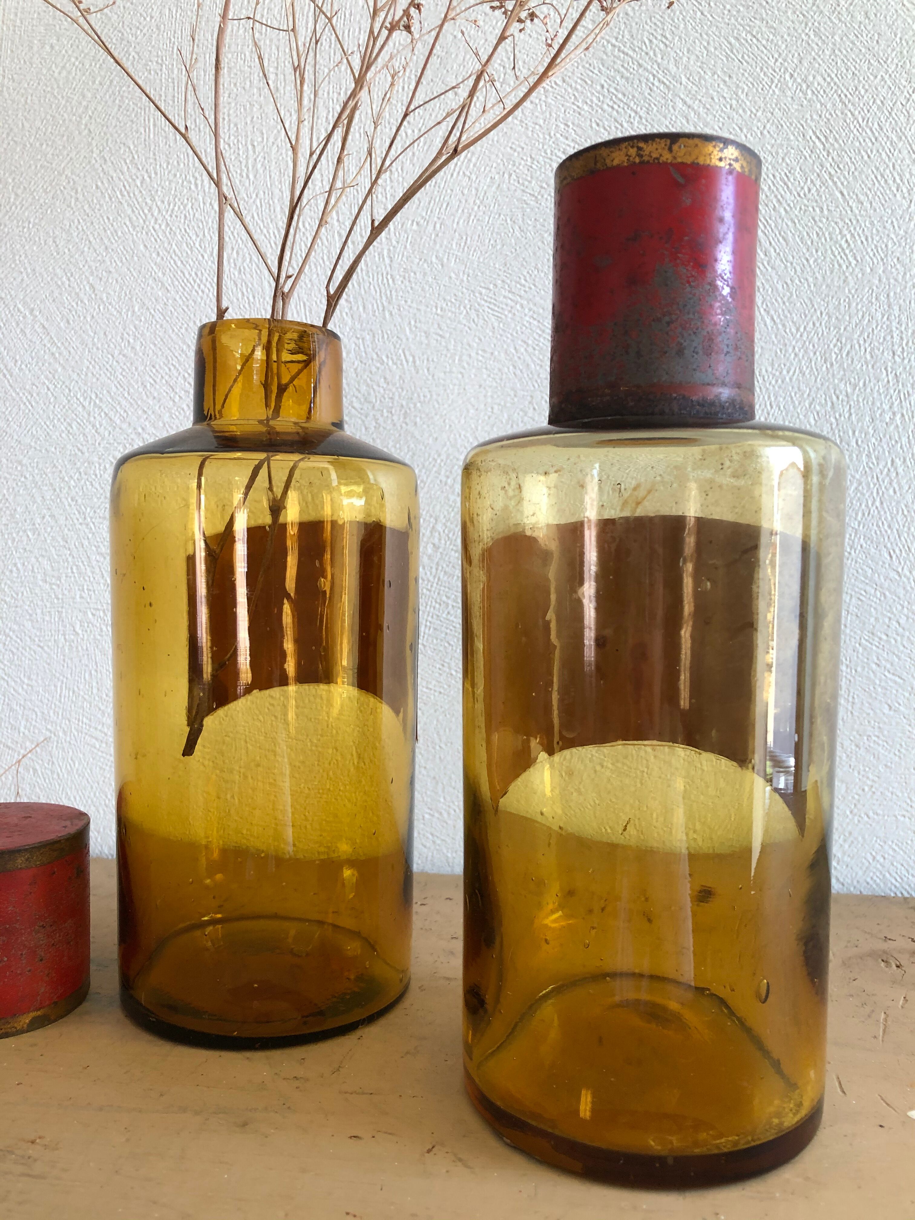 Lots of old brown glass pharmacy jars bottles