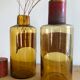 Lots of old brown glass pharmacy jars bottles