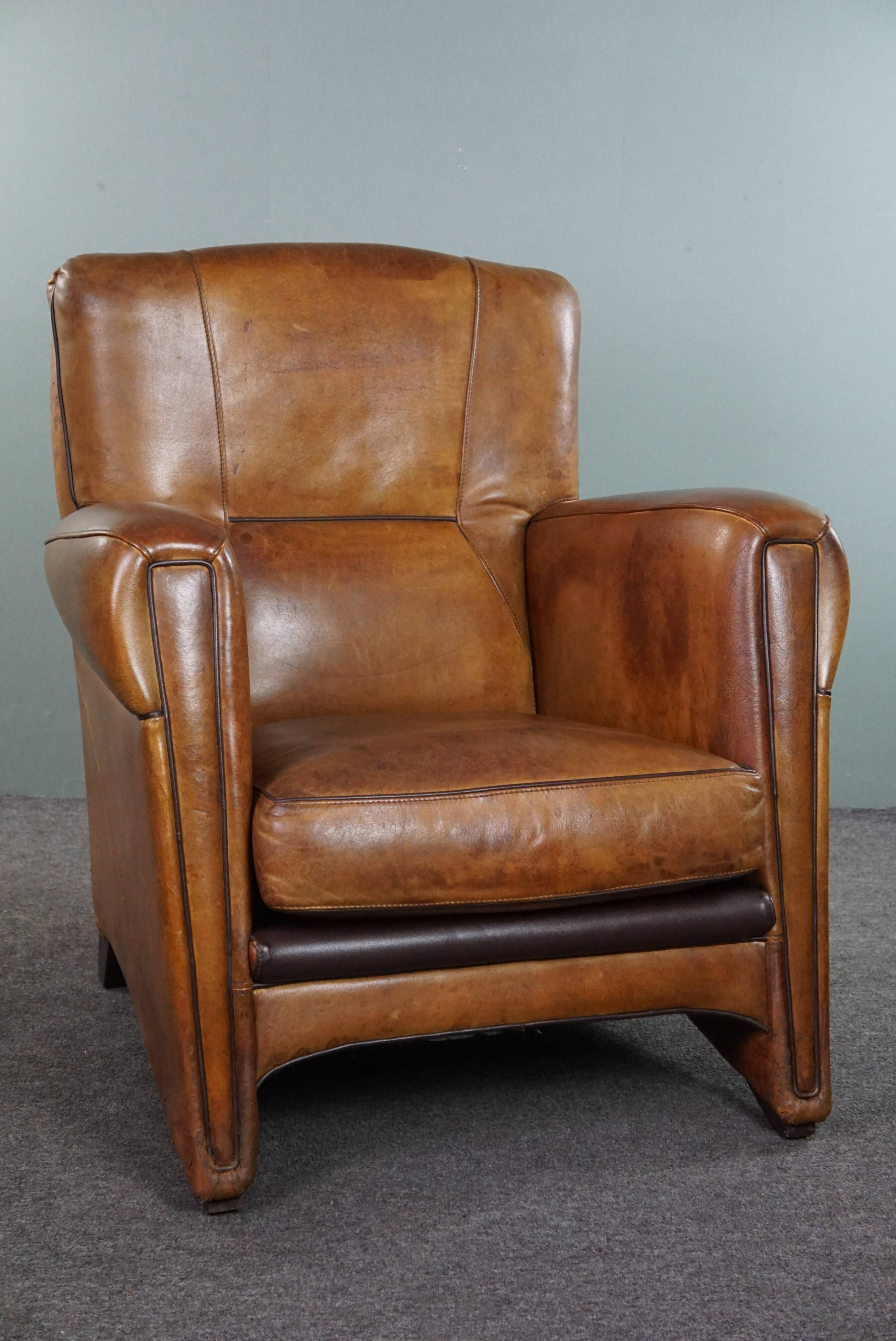 Striking modern design armchair made of high-quality sheepskin leather