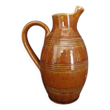 Mid-20th century brown glazed stoneware wine pitcher