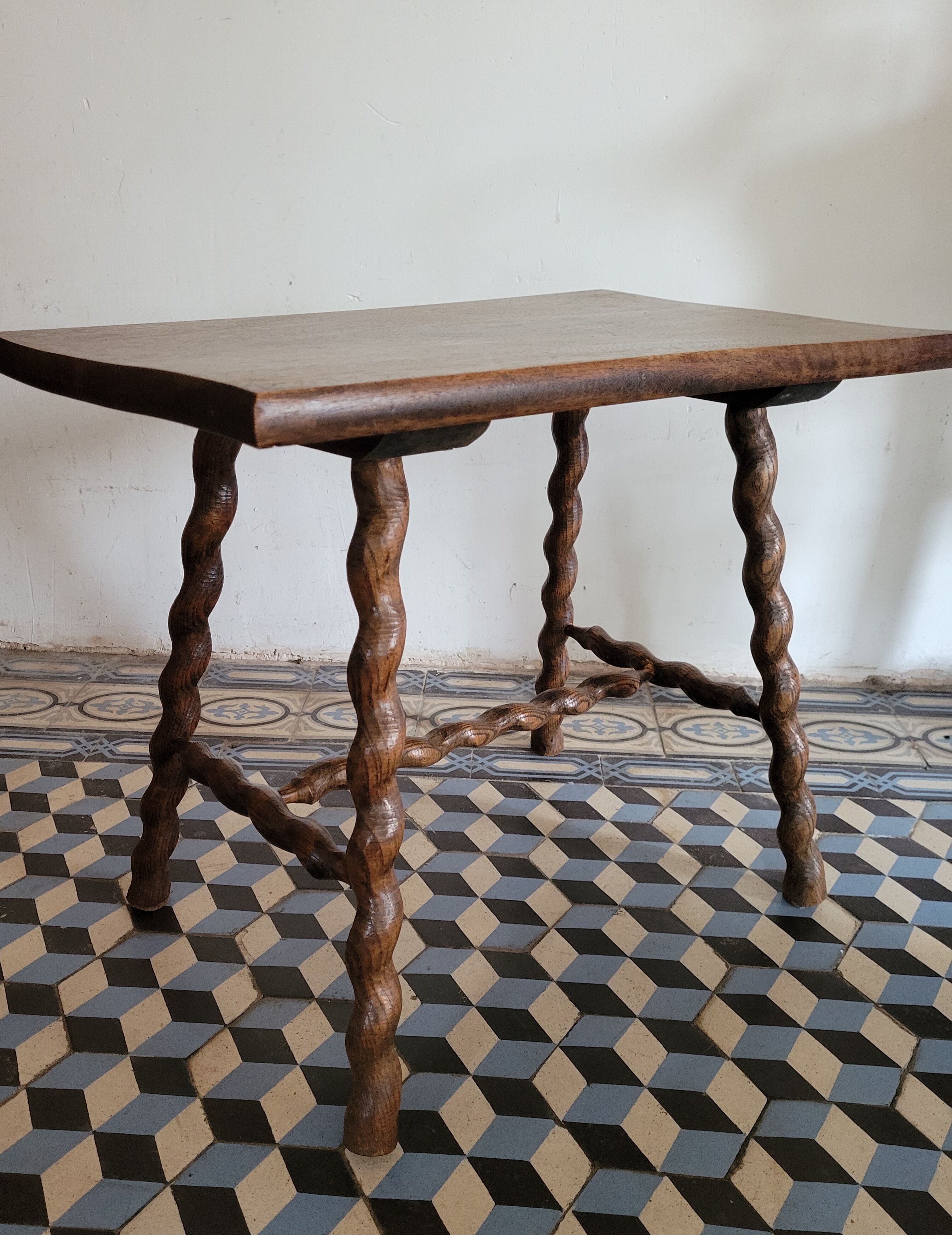 Brutalist coffee table with turned wooden legs