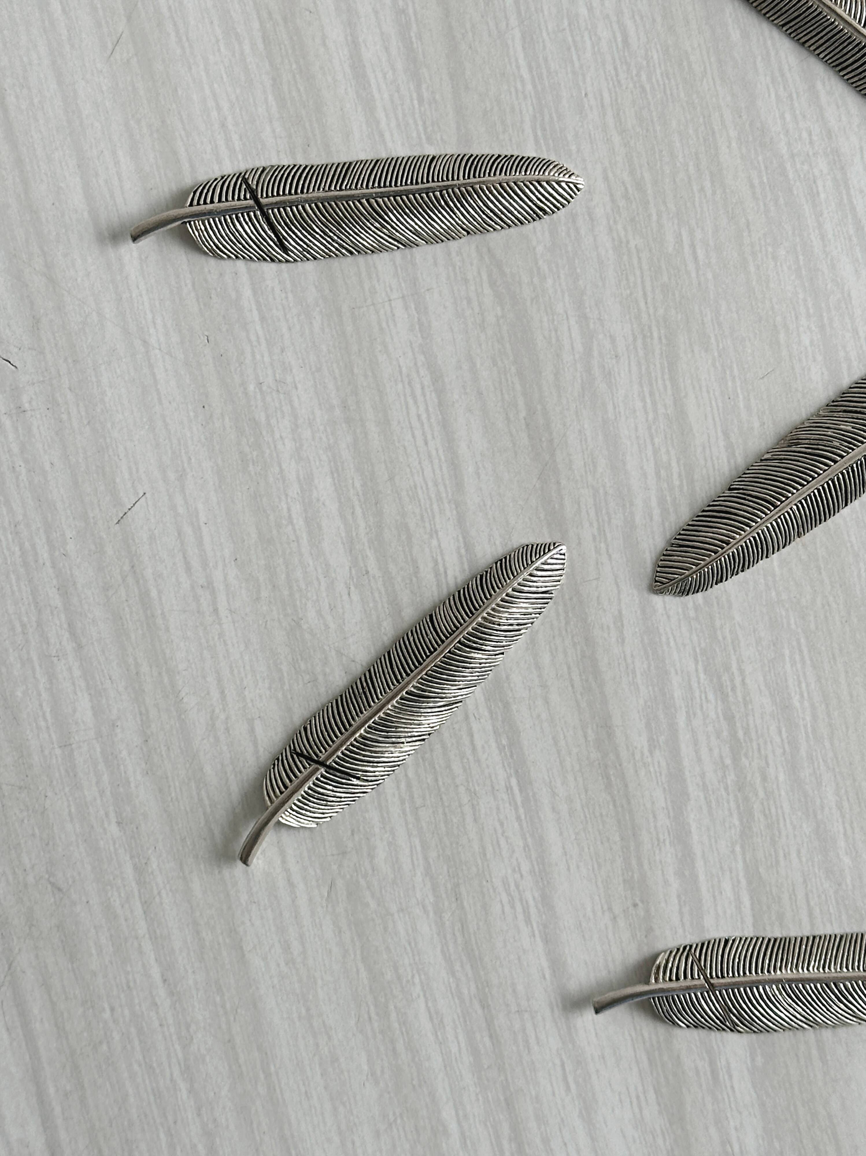 Set of 6 metal knife rests, name holders.
