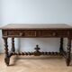 Antique solid wood carved desk in Louis XIII style.