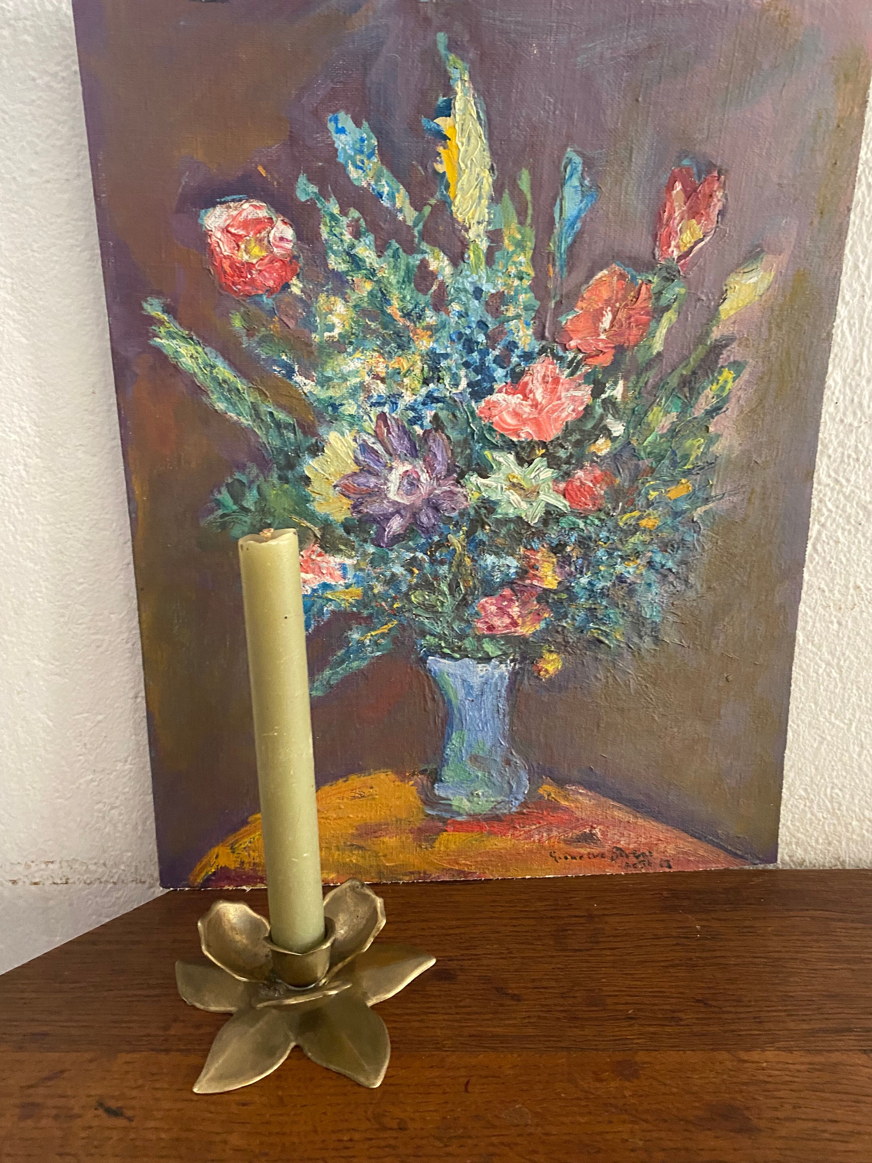 Brass flower candle holder.