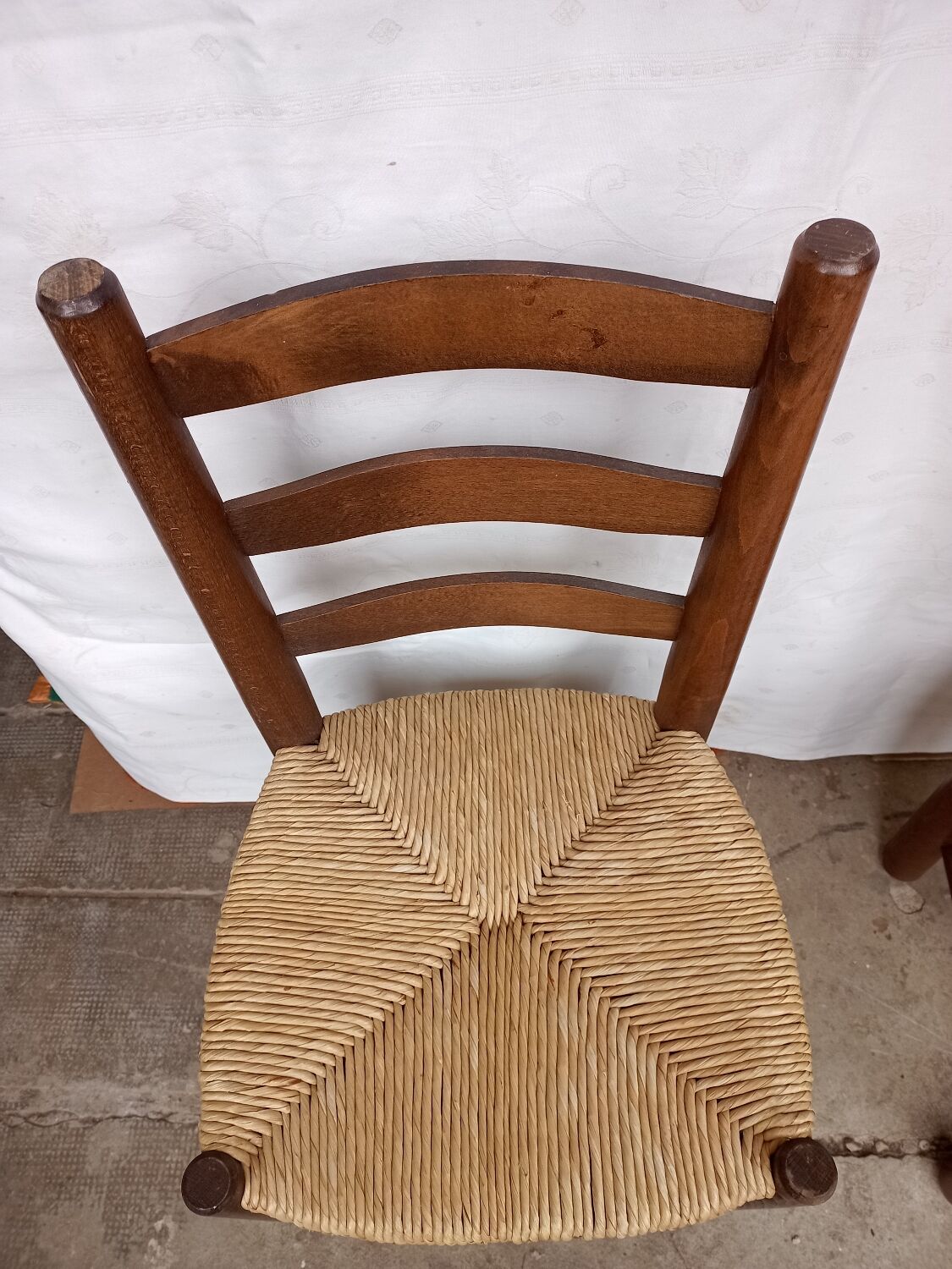 Brutalist chairs in walnut and straw