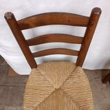 Brutalist chairs in walnut and straw