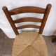 Brutalist chairs in walnut and straw