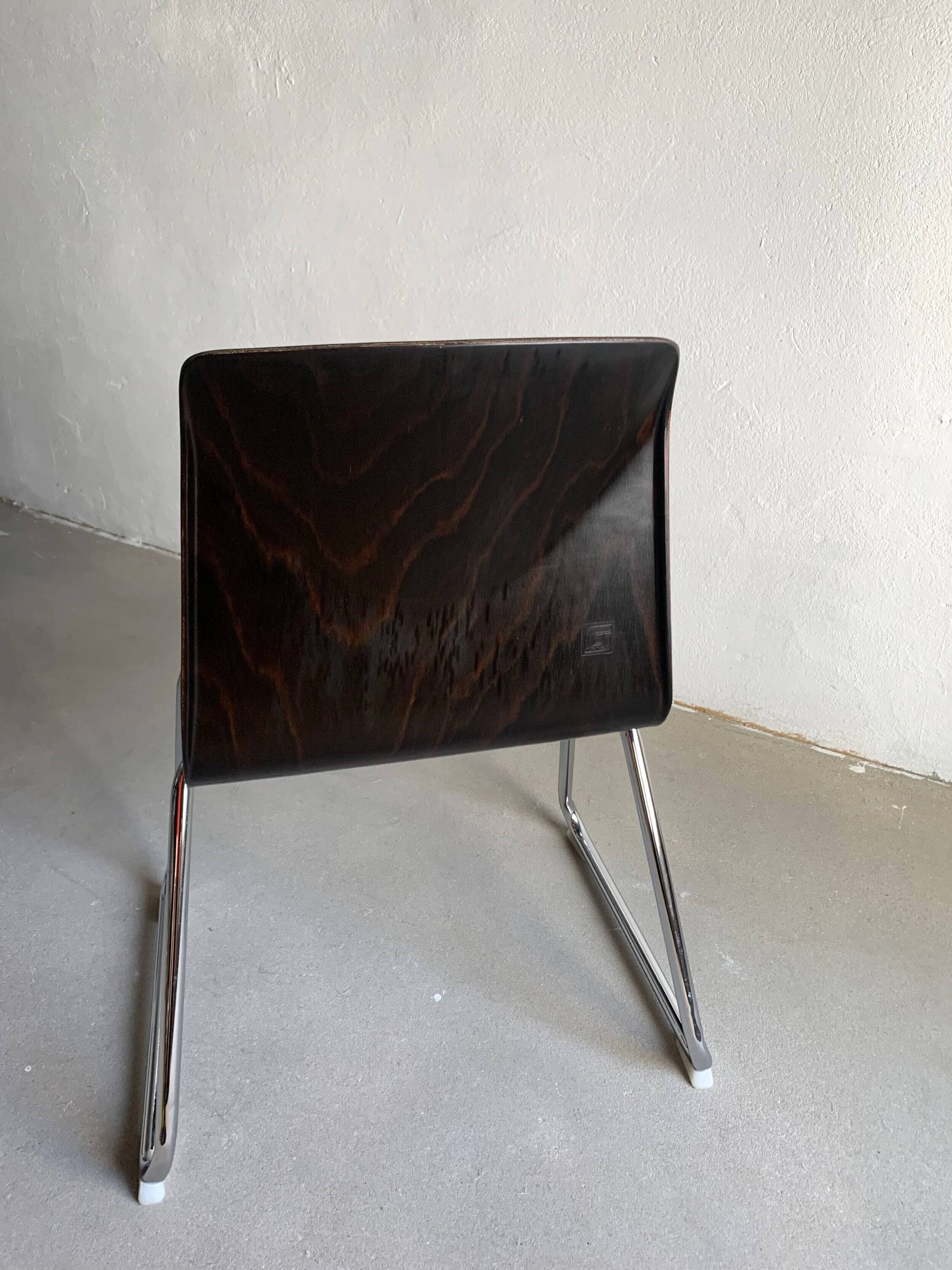 7 Pagholtz tubular steel stackable dining chairs | West Germany | 1960s