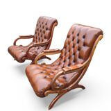 Pair of leather Chesterfields and footstools