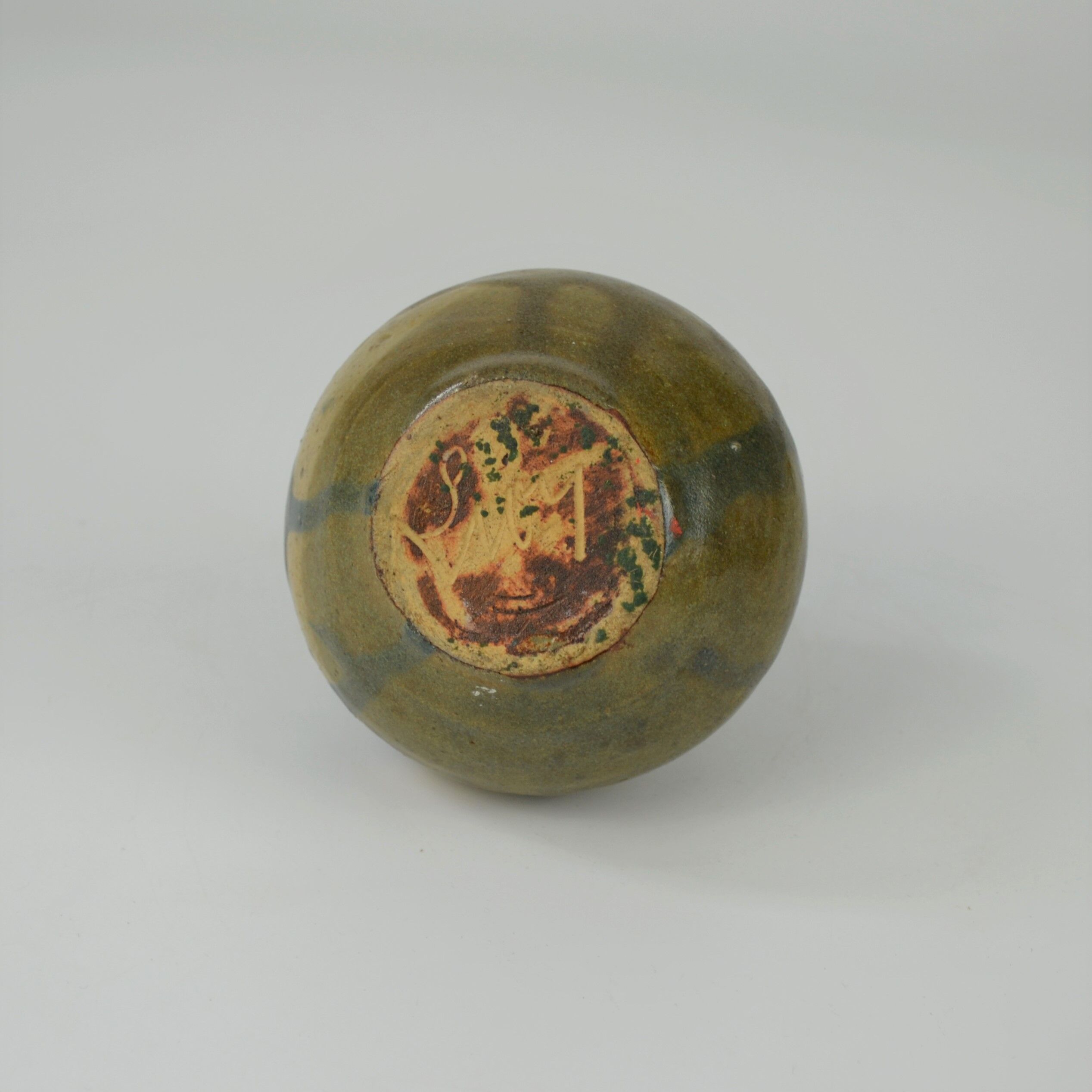 Sandstone ball vase by Eugène Lion