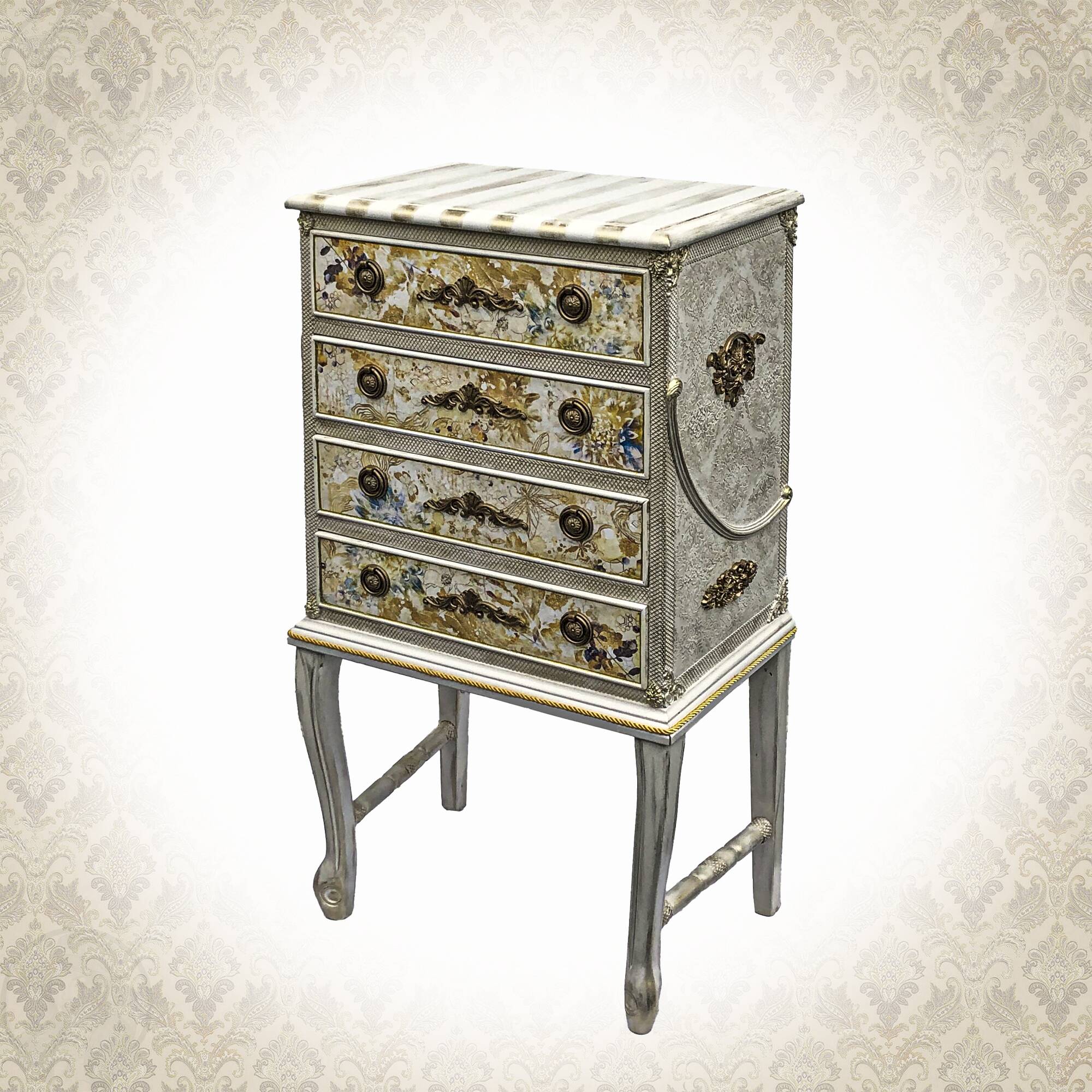 Vintage commode refurbished with 4 drawers in classic style with floral decor.