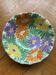 Fruit bowl decorated with coloured flowers