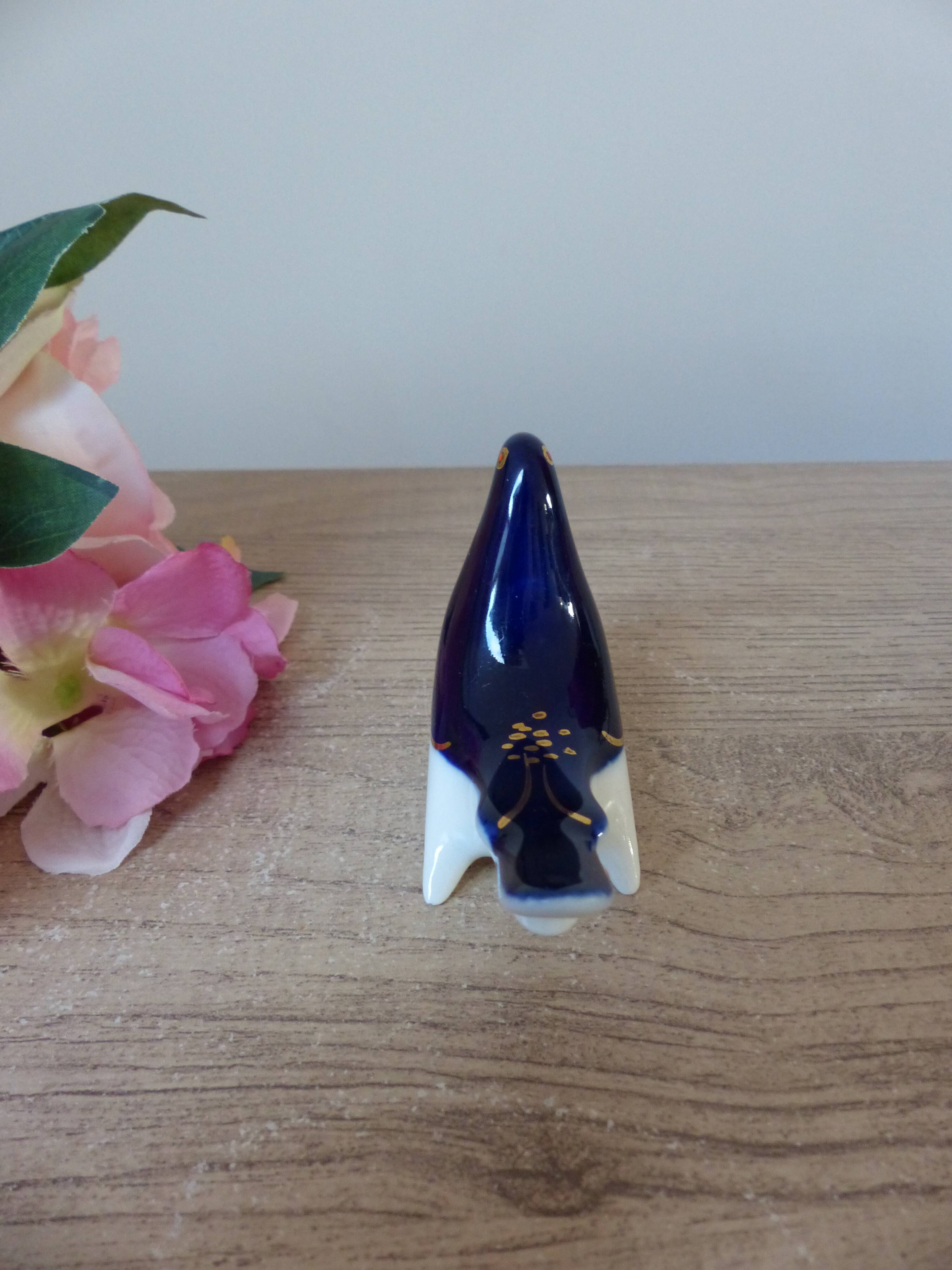 Vintage Soviet salt and pepper shaker in the shape of a cobalt blue bird.