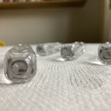Set of four crystal knife holders signed Daum