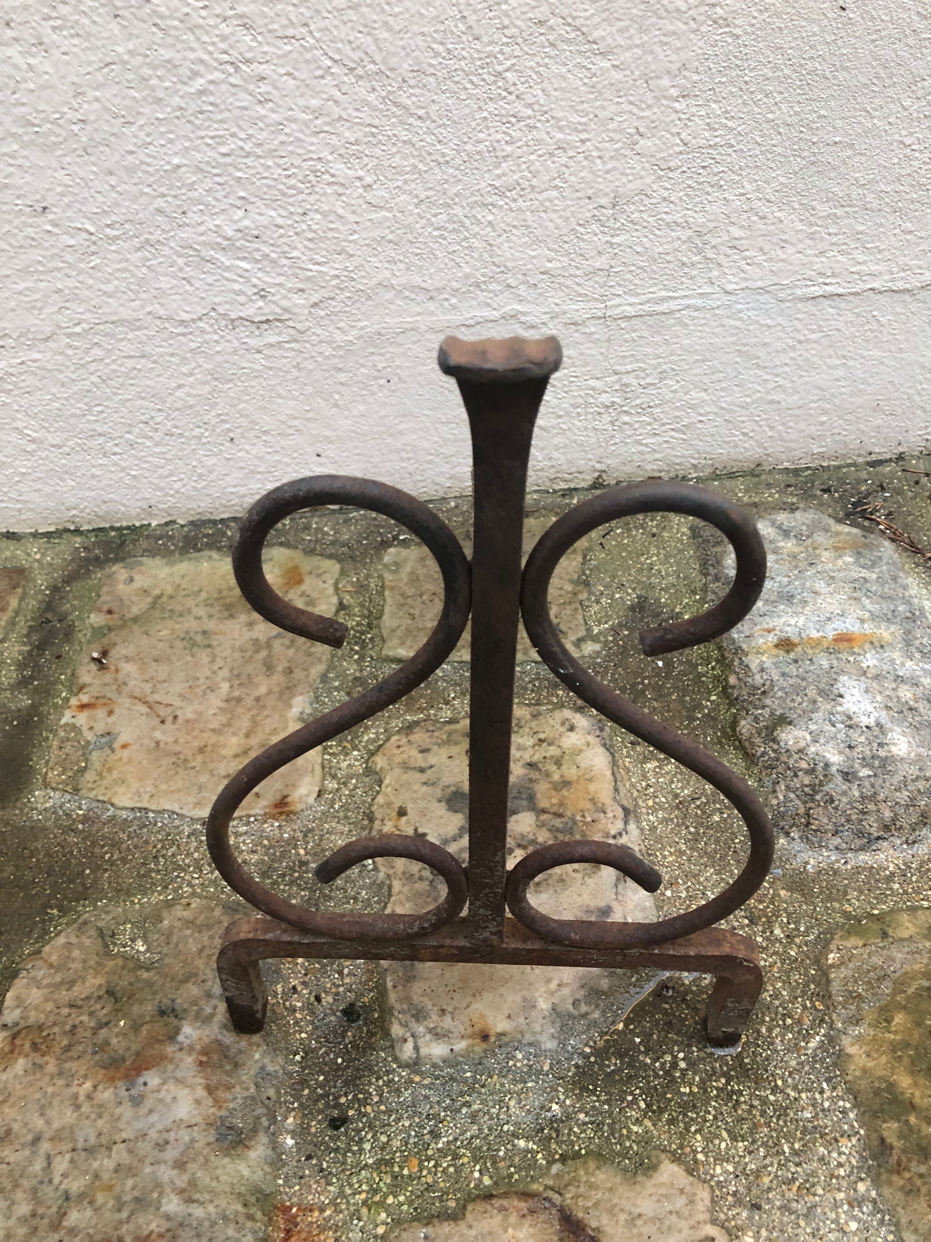 Pair of wrought iron pegs