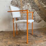 Pair of postmodern orange armchairs and bouclé wool fabric