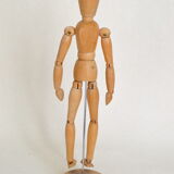 Articulated wooden puppet