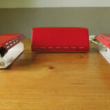 Wall lamp with red swivel shutter