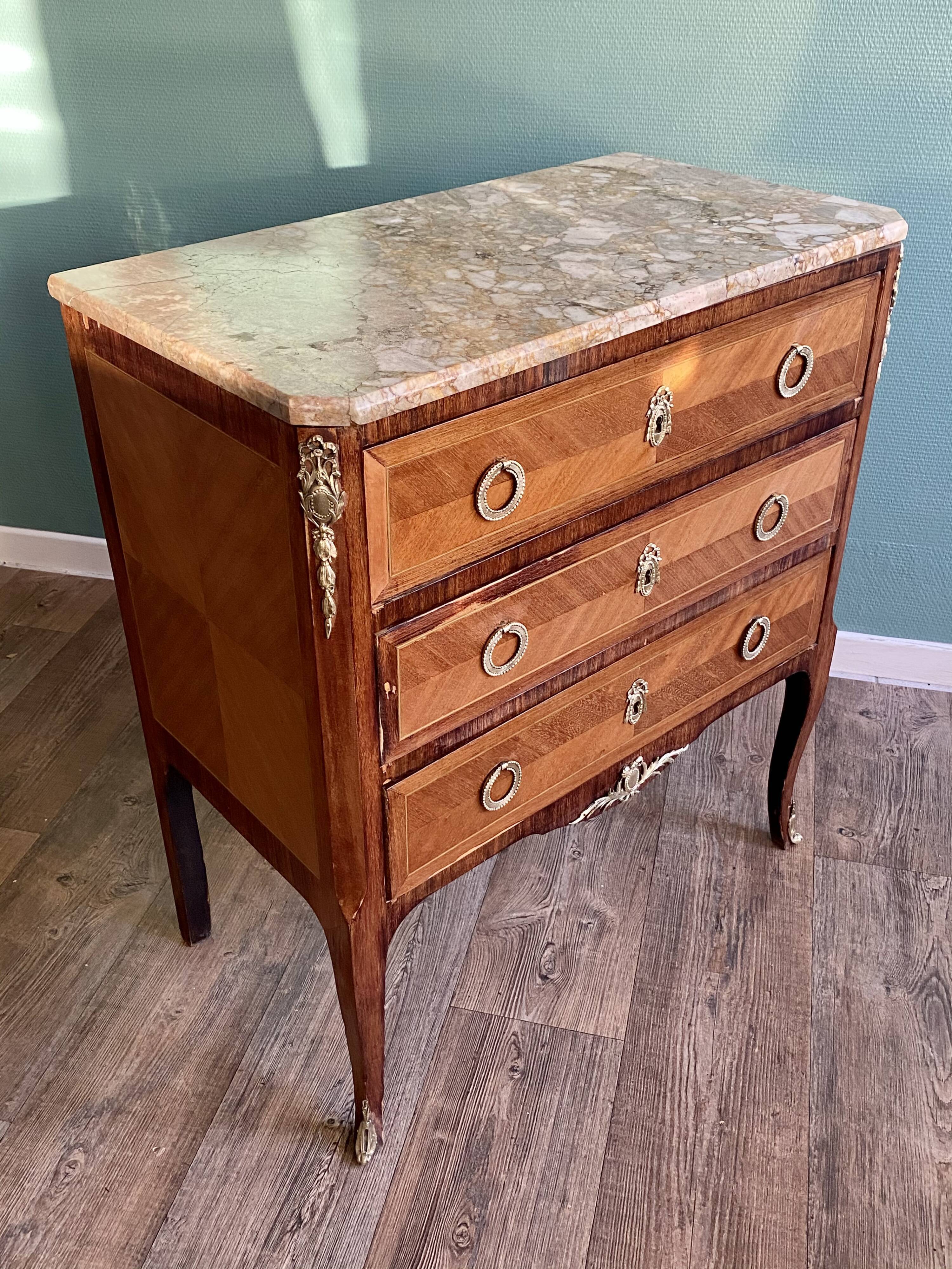 Small Louis XV-style chest of drawers  in veneer and bronze