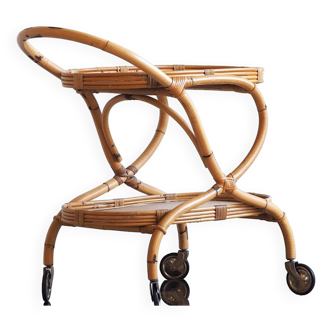 Vintage bamboo and rattan serving trolley on wheels