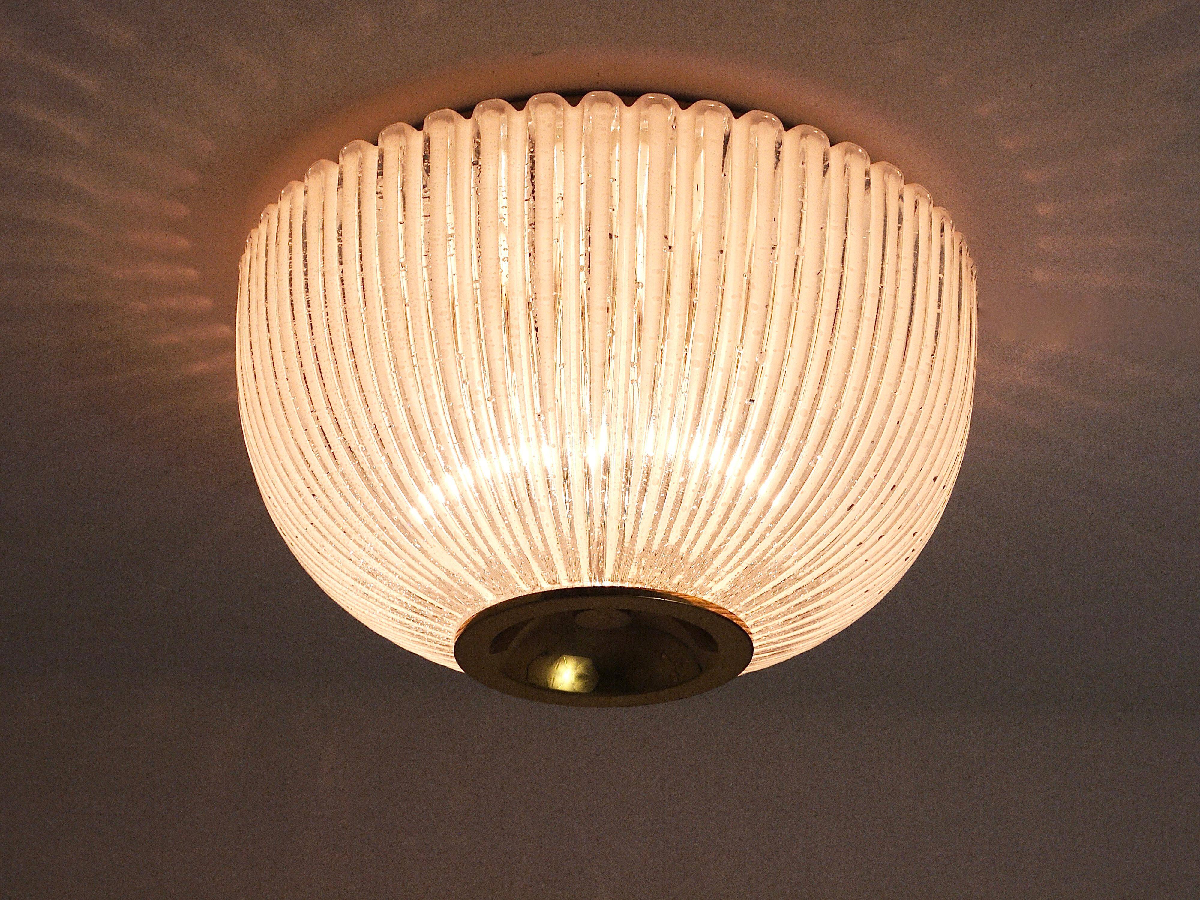Large striped glass ceiling lamp in brass, Limburg, Germany, 1970s.