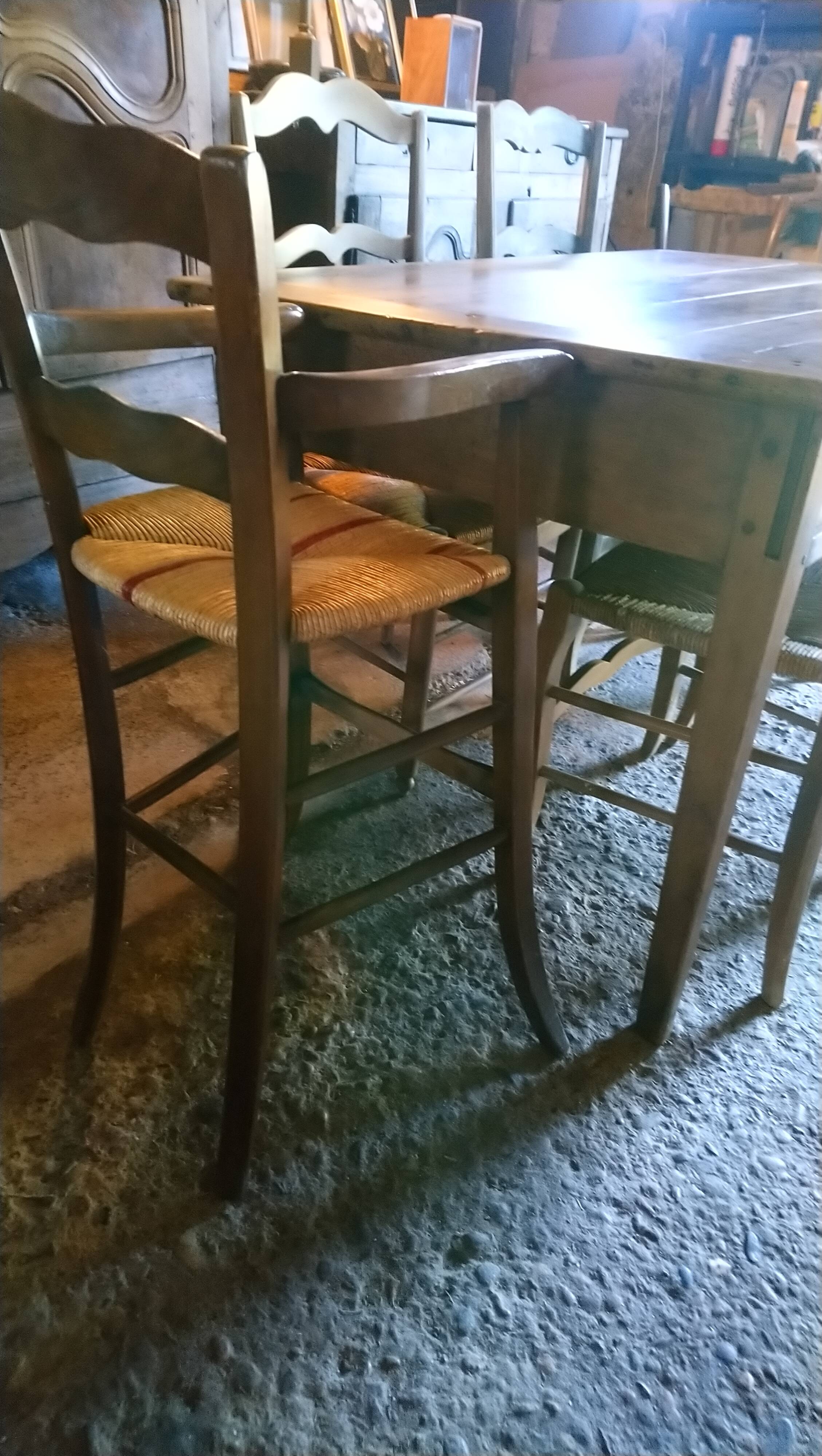 Child's high chair with a rush seat in walnut