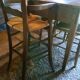 Child's high chair with a rush seat in walnut