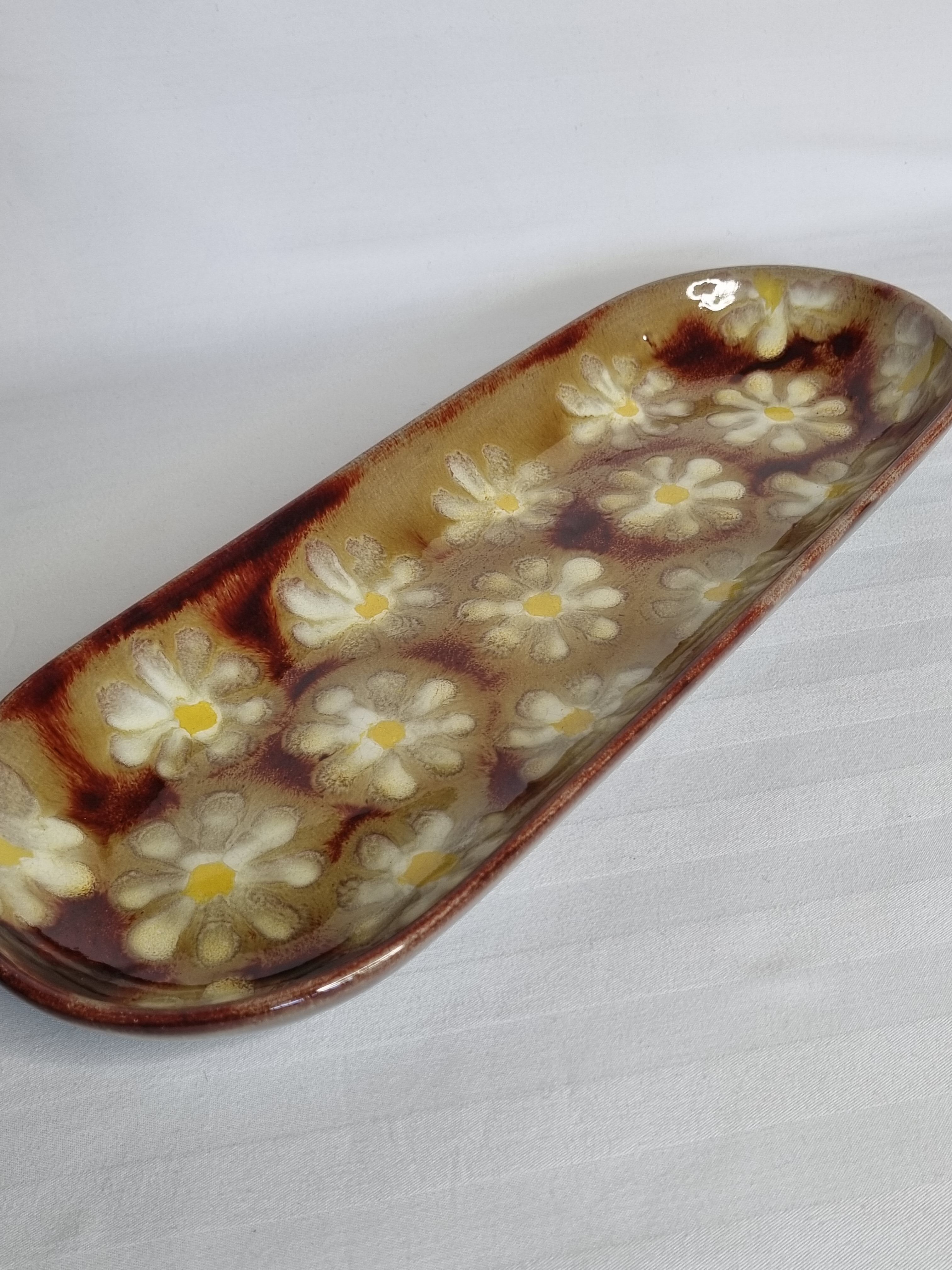 Enamelled terracotta dish decorated with vintage flowers, 40 cm
